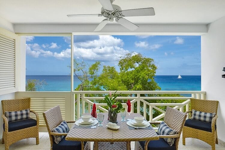 dining set on terrace overlooking ocean