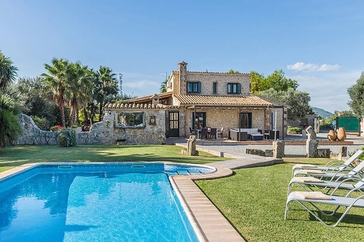 rustic villa with pool and lawn