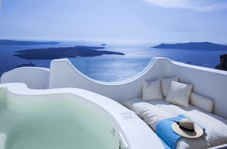 white balcony overlooking ocean