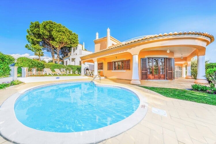 yellow villa with swimming pool