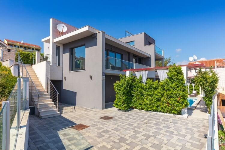 grey modern villa with patio