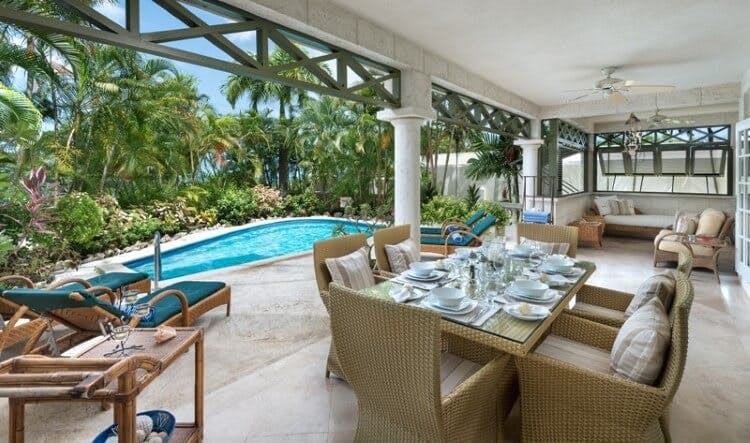 Summerland 102 vacation rental - image of covered patio area with dining and seating area and private pool
