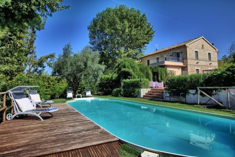 Villa Sinfonia traditional Italian farmhouse-style vacation home with outdoor private pool and decked area