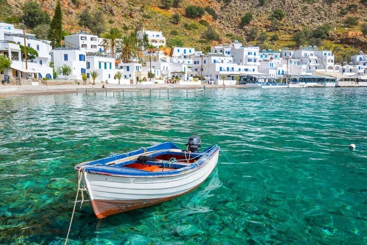 boat in clear water in greece