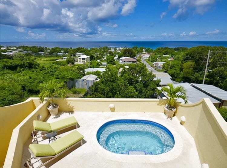 Westlook 2 vacation rental - view of private pool with sun loungers around it, looking out towards the Caribbean Sea