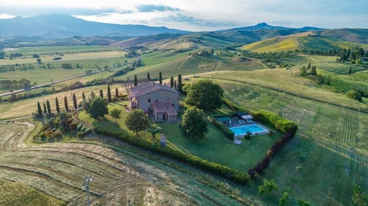 aerial view of stone villa and surrounding countryside