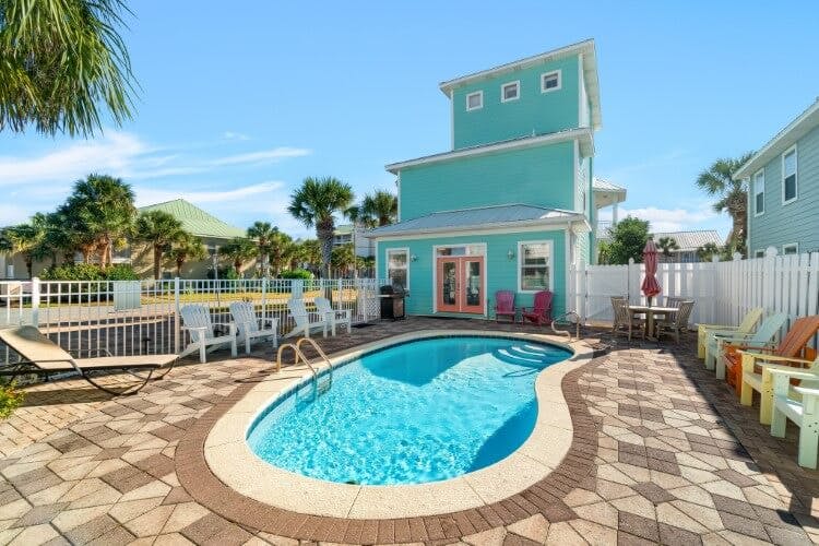 blue vacation rental with pool