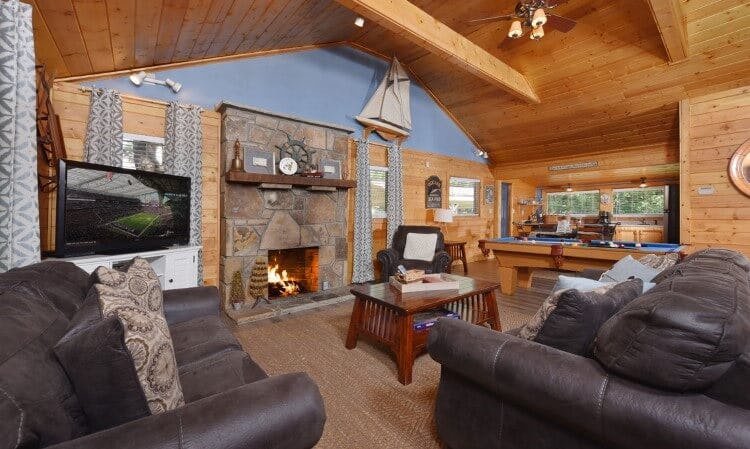 rustic cabin living room with fireplace