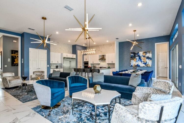 White and blue decorated living room at Villatel Village 19 vacation rental