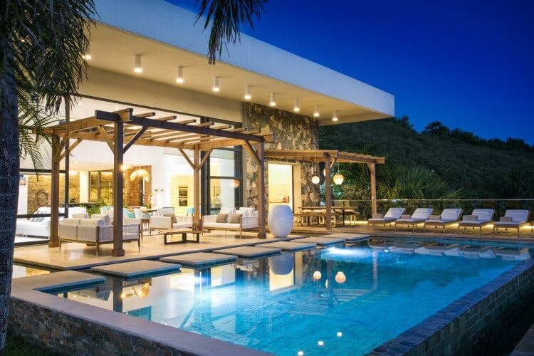 Emeraude vacation rental - image taken at dusk showing a villa with a private pool and sun loungers
