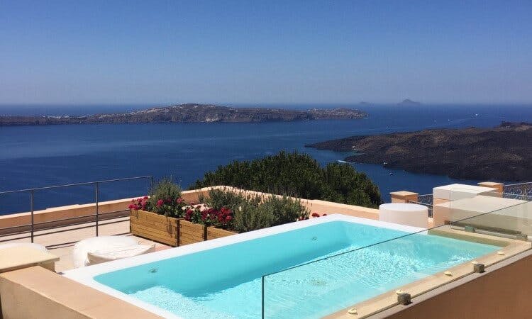 pool overlooking santorini ocean