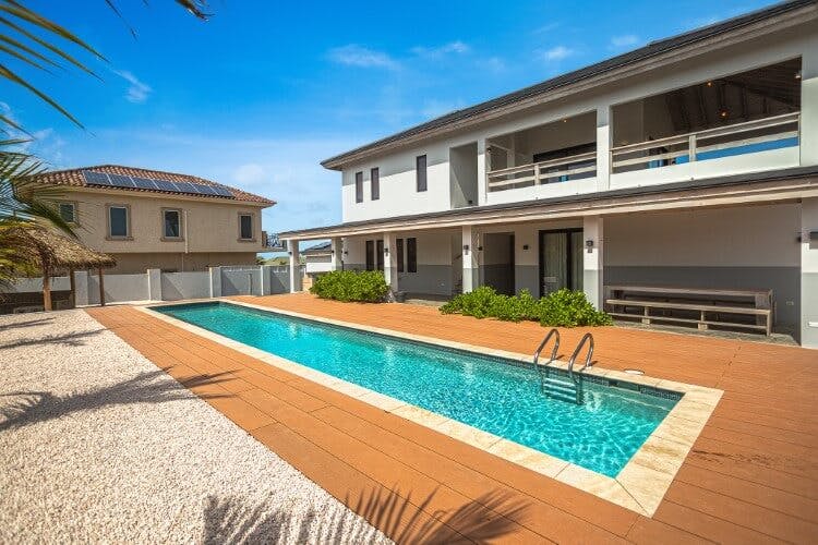 outdoor area of villa with deck and pool