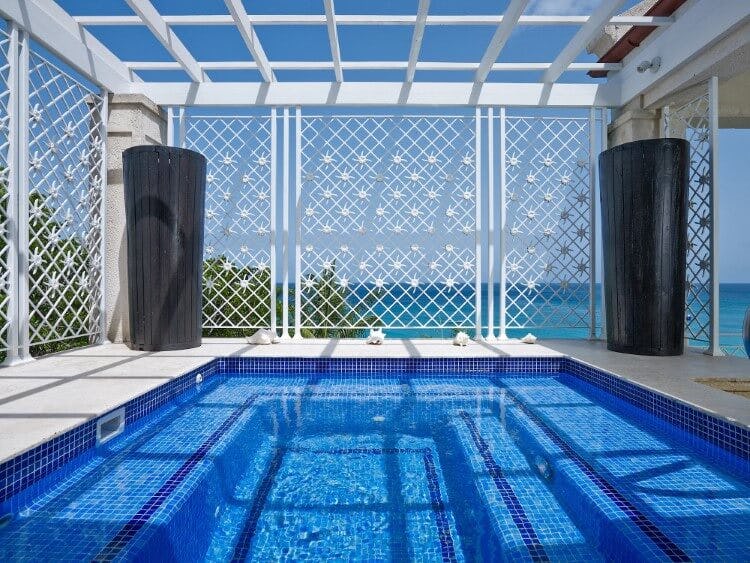 pool surrounded by patterned screen