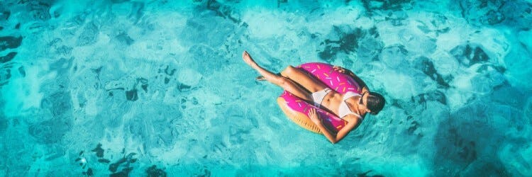 woman on float in pool