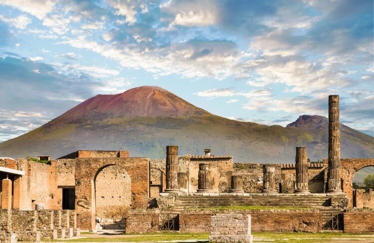 The ruins of the city of Pompeii with Mount Vesuvius in the background