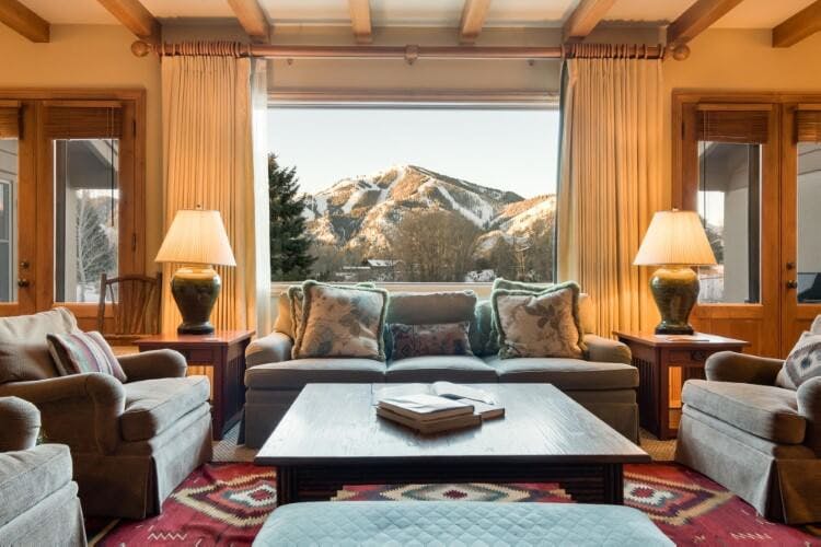 living room with mountain through window