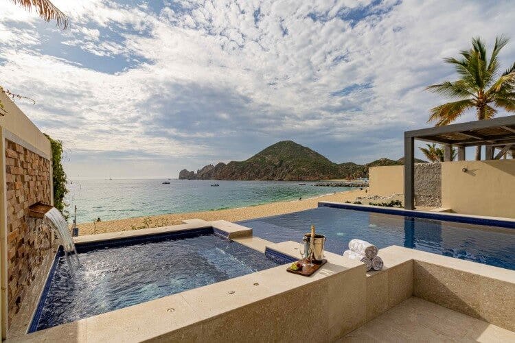pool and hot tub overlooking beach