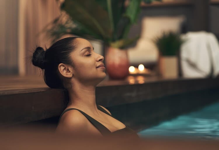 A woman relaxing in a spa