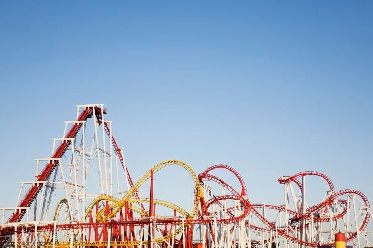Roller coaster against a cloudless blue sky