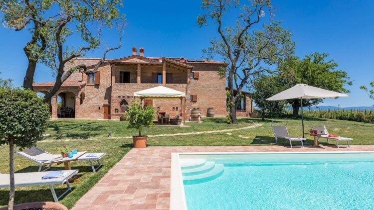 rustic brick villa with pool