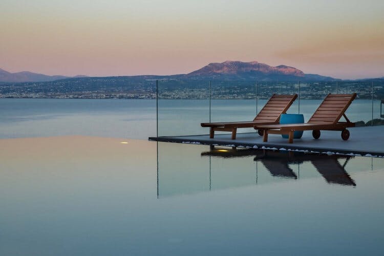crete - villa peach deckchairs overlooking ocean