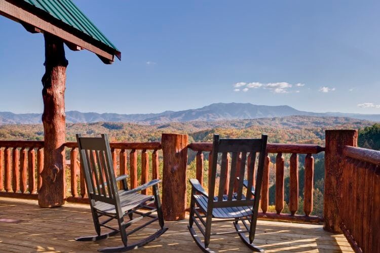 balcony with rocking chair overlooking mountains