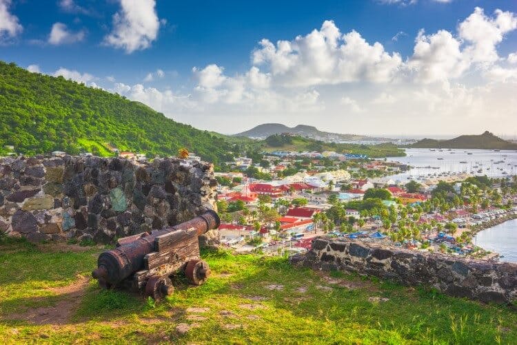 view of st martin town with cannon in foreground