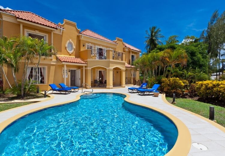 bright orange villa with oblong pool