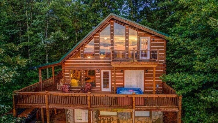 log cabin surrounded by trees