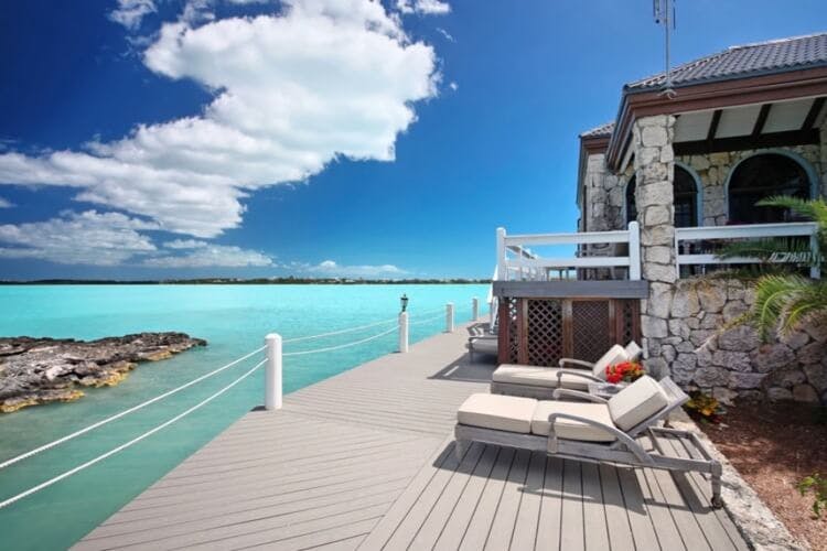 deck and loungers overlooking ocean