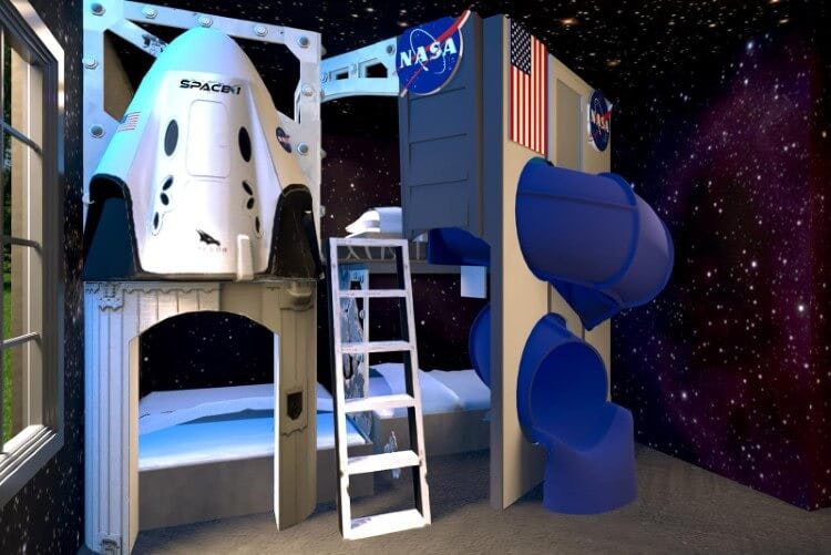 A NASA themed bedroom with bunkbeds and a slide in Villatel Harbor Island 1 vacation rental