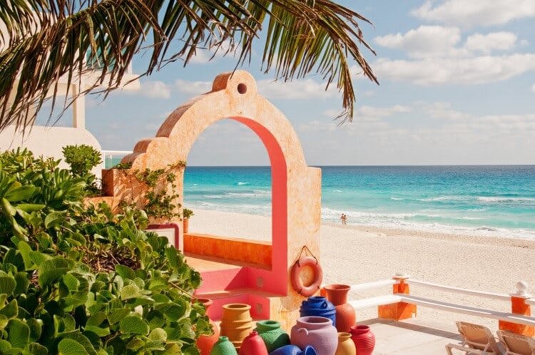 Cancun beach with traditional Mexican pottery
