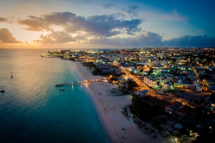 aerial view of city and beach at dusk