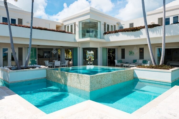 white villa with pool and jacuzzi