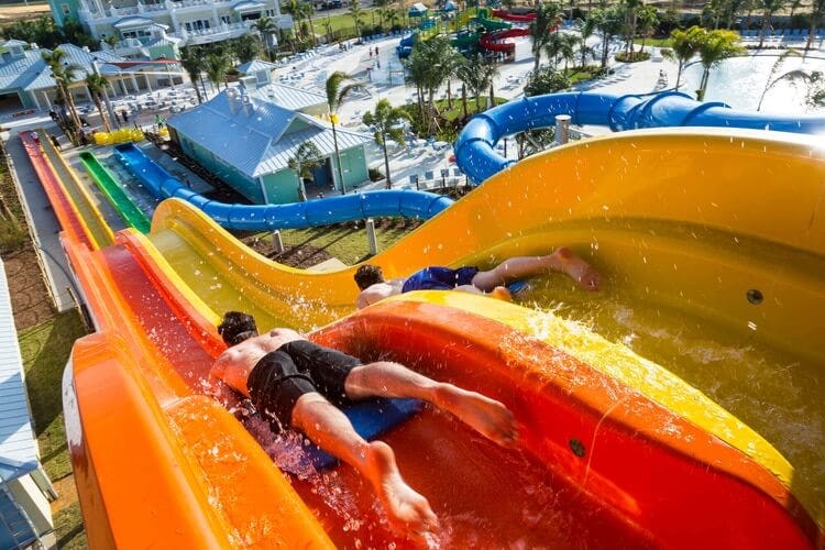 two people going down a water slide