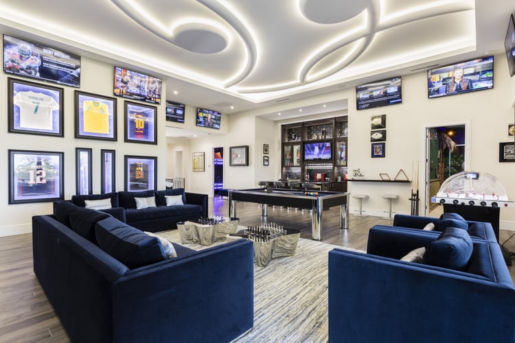 This villa features a sports themed game room