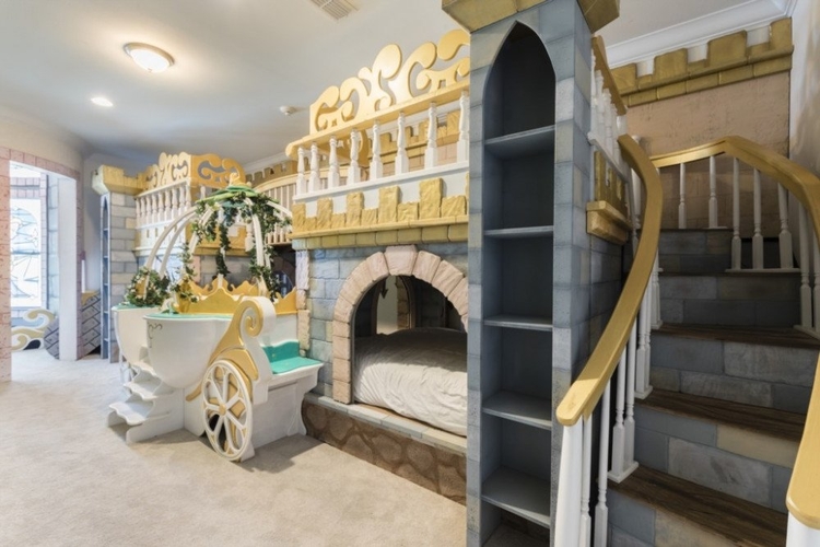 A custom-built castle bunk bed with a princess carriage