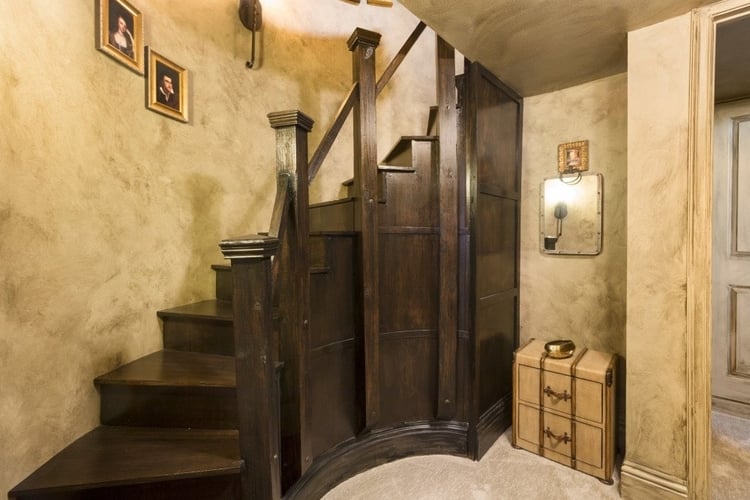 The secret passageway leads to a spiral staircase