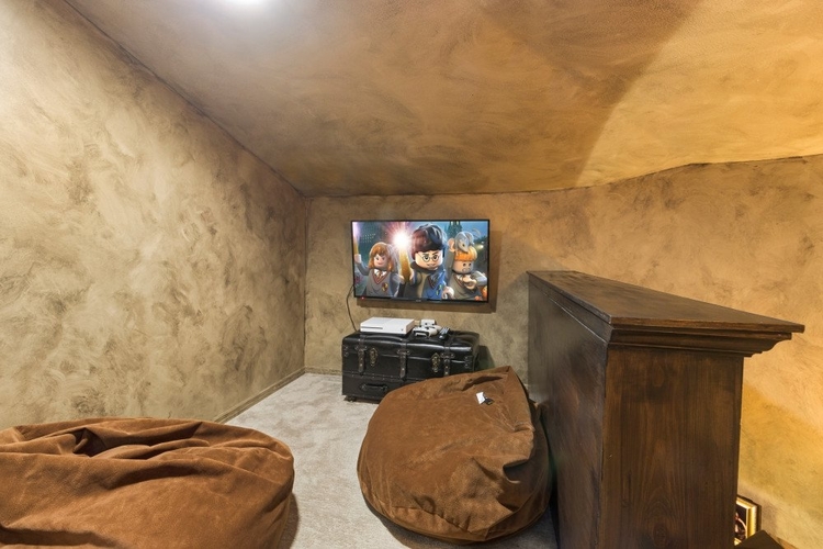 Upstairs you will find a hidden snug with beanbags and a flat-screen TV