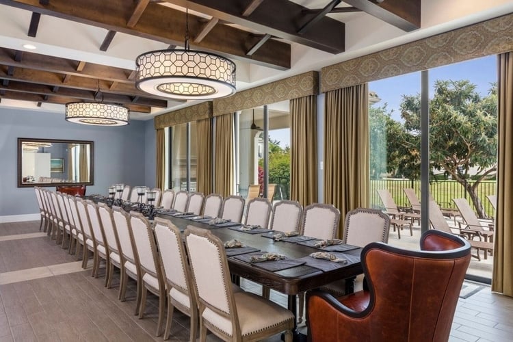 The huge dining room has pool views and seats up to 26 guests