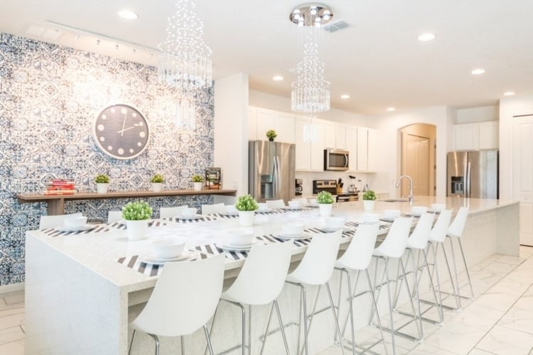 The villa has a fully equipped kitchen with breakfast bar seating