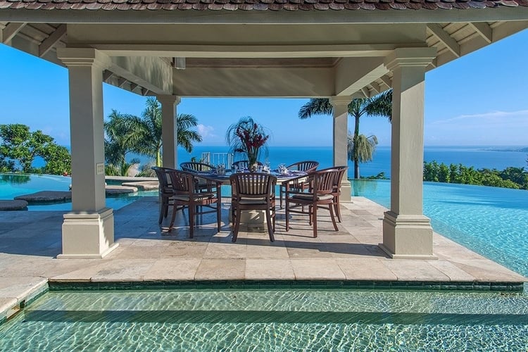Caribbean villa with alfresco dining area overlooking the Caribbean Sea