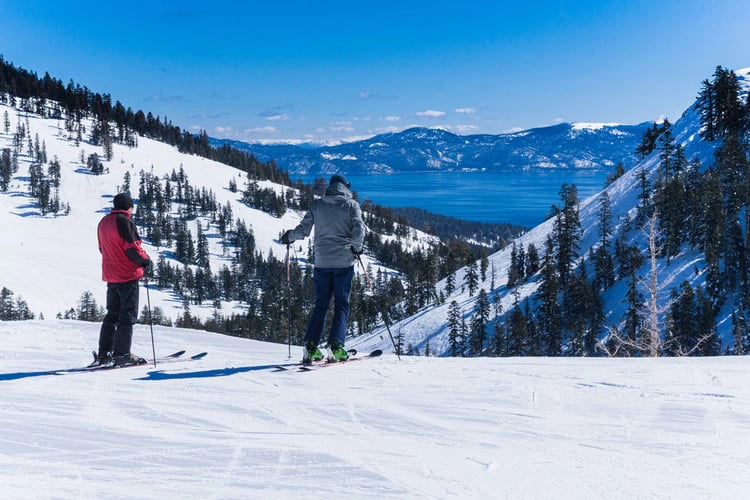 Lake Tahoe for Valentines day 2024. Two people on a high ski slope in Lake Tahoe