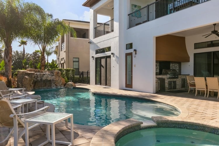 This vacation rental in Orlando has a private pool and a spillover tub