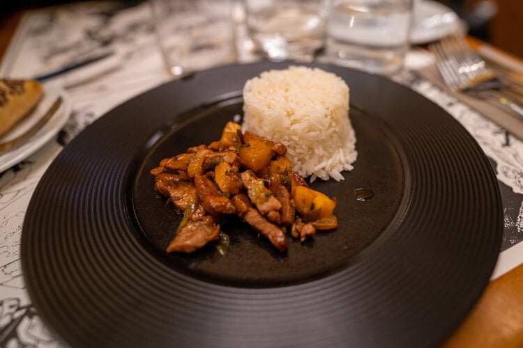 Plate of rice and chicken and vegetables