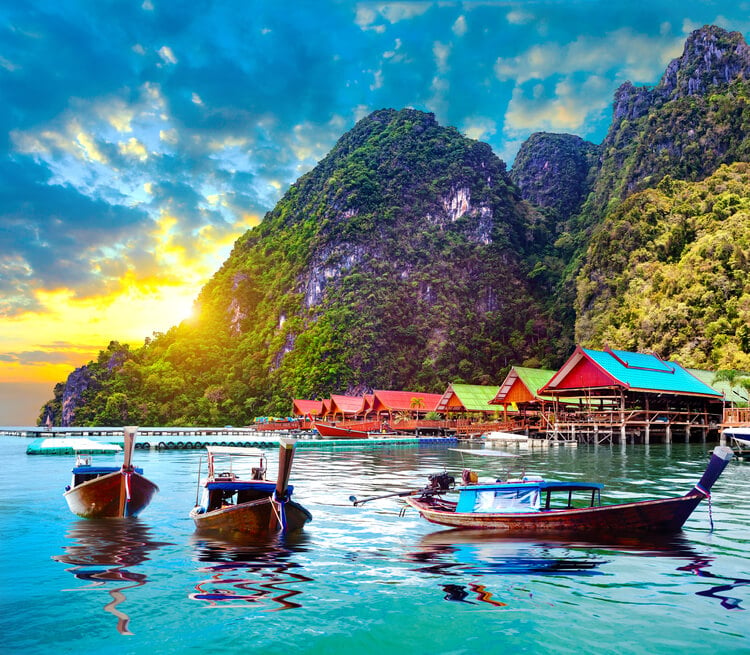 Phuket scenery with traditional boats and huts