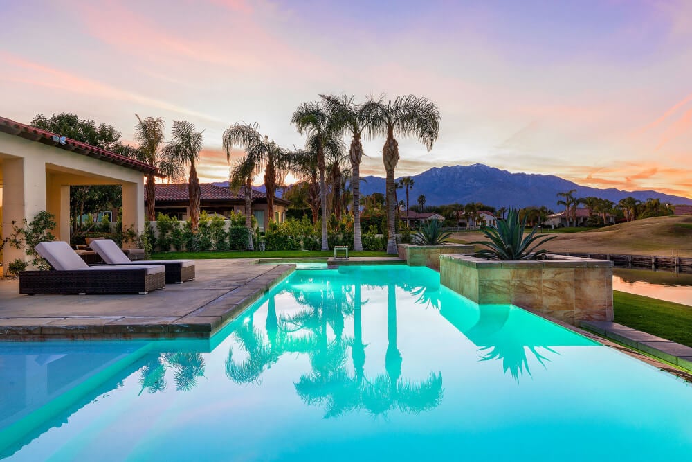 A beautiful Rancho Mirage home with an infinity pool and mountain view