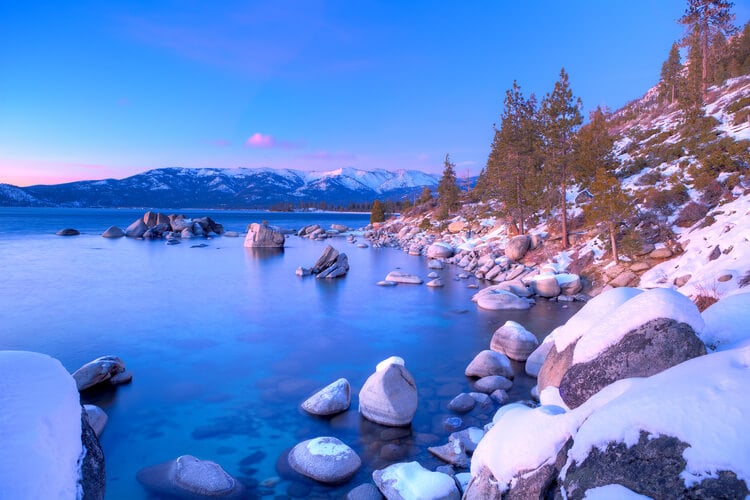 The shores of Lake Tahoe coveres in snow and ice in the winter