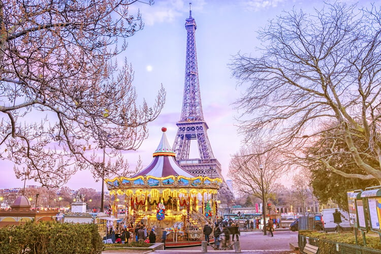 The Eiffel Tower with a Christmas market below