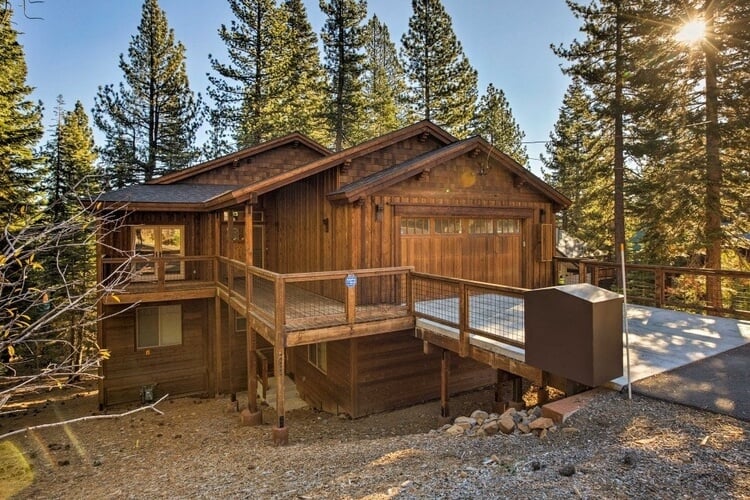 A Lake Tahoe cabin exterior view, surrounded by pine forest